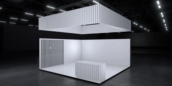 Minimalist white exhibition booth with geometric lighting and modern design.