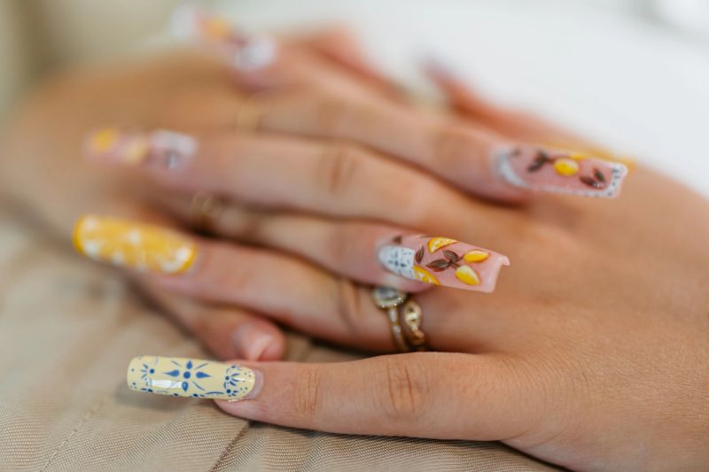 Beautifully manicured nails with artistic nail designs at Kimmie's Nail Spa.