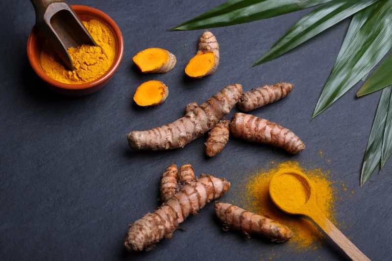 Turmeric (Curcuma longa) is a spice, widely used in Asian cooking. It is a rhizomatous herbaceous perennial plant, in the ginger family, Zingiberaceae. Turmeric plants are widely grown in tropical areas of India