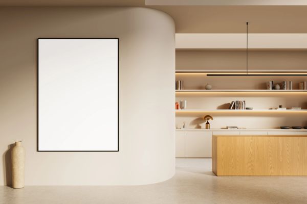 Blank poster on wall in modern kitchen space.