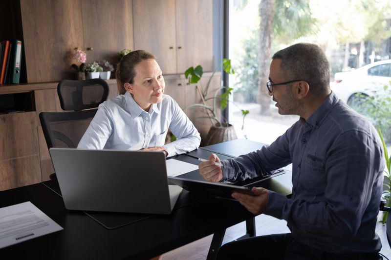 Business people discussing on their project