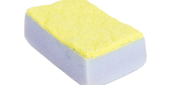 Yellow and white rectangular cleaning sponge.