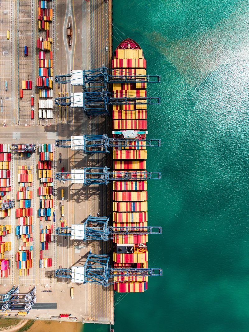 Aerial view of the port of felixstowe, uk, with a container ship being loaded