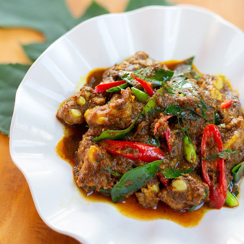 Stir-fried pork ribs with curry paste or stir-fried spicy pork ribs is a Thai stir-fry dish with a strong, spicy flavor and the aroma of curry paste.