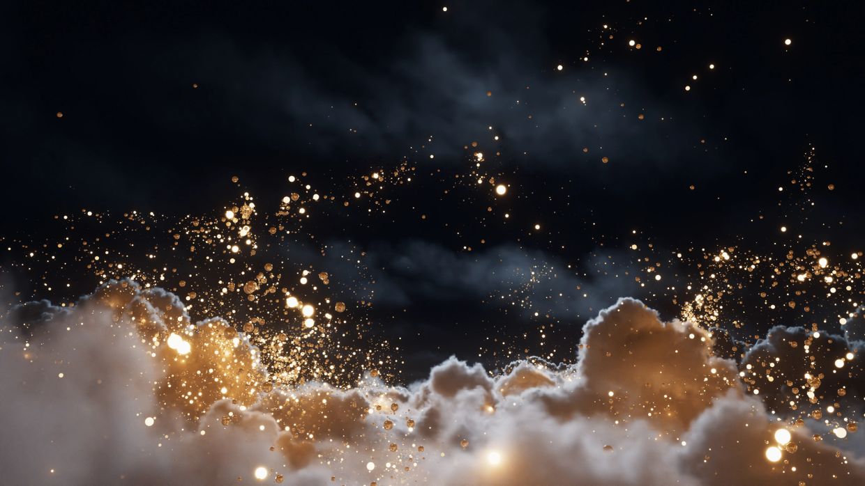 Golden sparks illuminate dark clouds against a night sky.