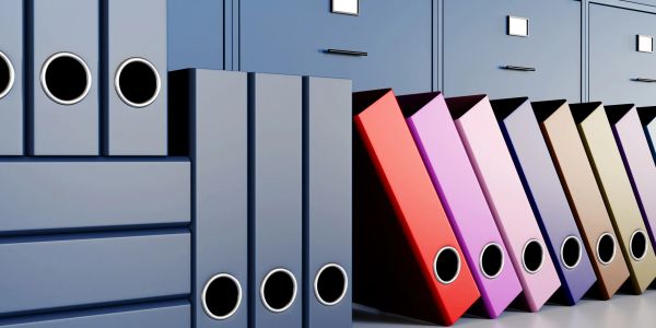 Colorful office binders in a row.