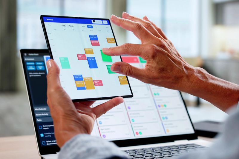 Appointment Schedule Planner And Date Calendar On Laptop And Phone