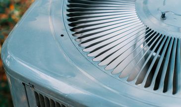 Outdoor air conditioner with proper clearance 