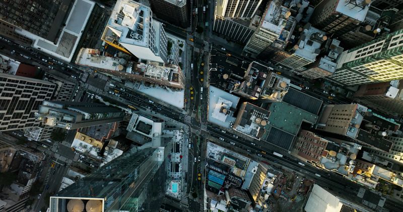 An aerial shot of the busy streets in Midtown Manhattan on a sunny day in New York City.Authorization was obtained from the FAA for this operation in restricted airspace.