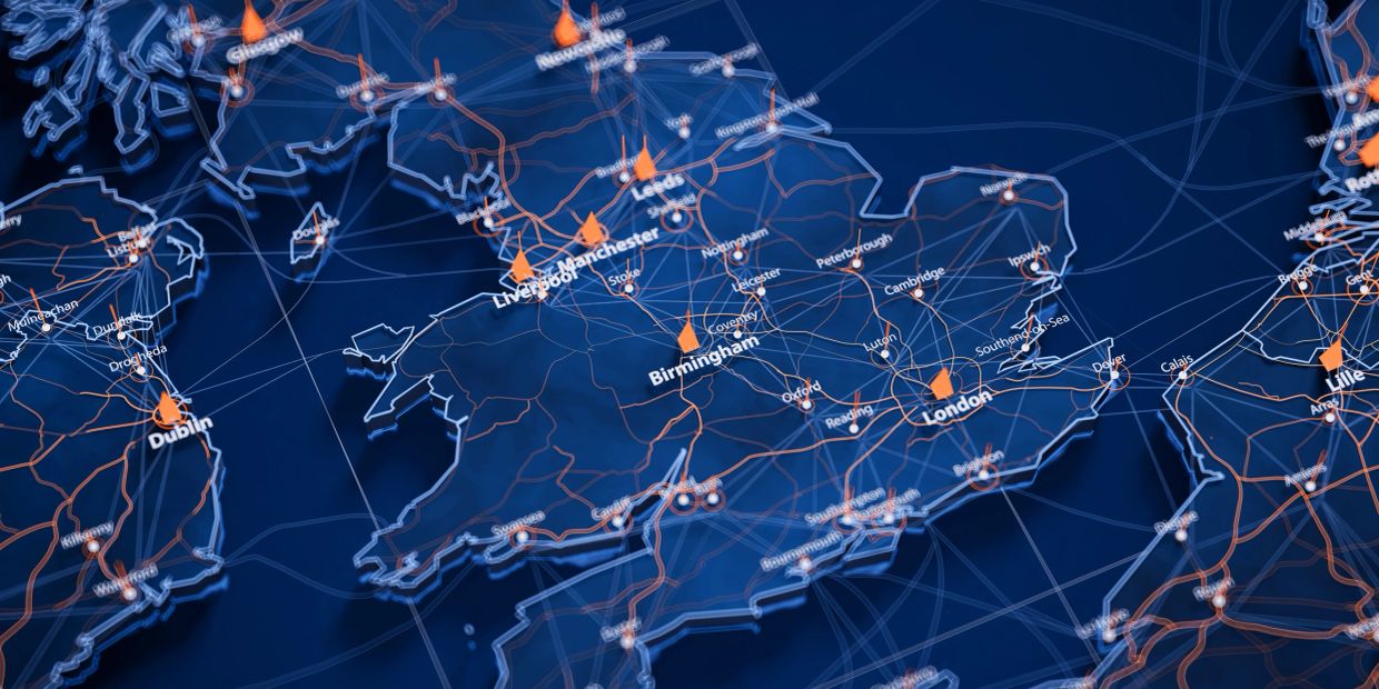 Digital map highlighting UK and Ireland cities with glowing markers.