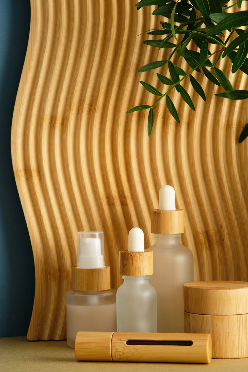 Eco-friendly skincare containers with bamboo accents and leafy decor, styled for sustainable beauty and wellness branding.
