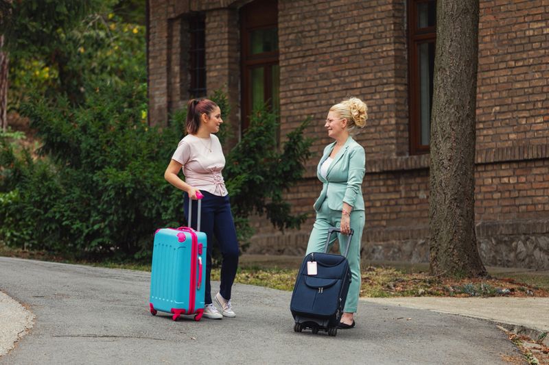 Family with luggage waiting for transportation
