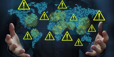 Person with digital world map and warning icons.