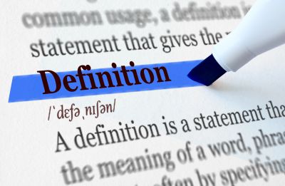 Close-up of the word 'Definition' highlighted in blue in a dictionary.