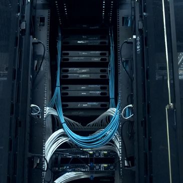 Server rack with organized cables in a data center.