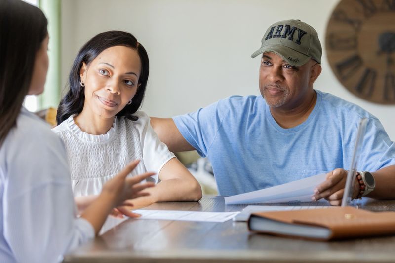 A former service member sits with his wife to talk about retirement savings
