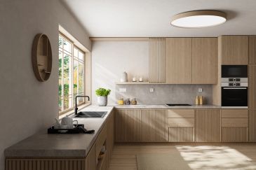 Cocina moderna con luz natural y diseño minimalista.