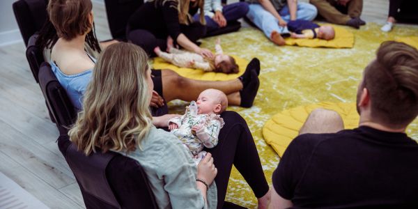 Parents and babies in a group session.