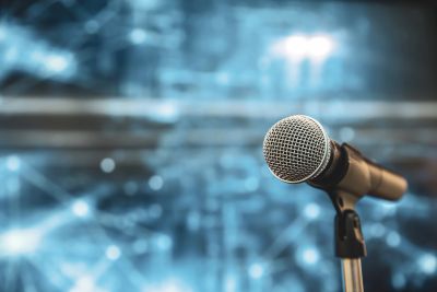 Close-up of a microphone on a stand.
