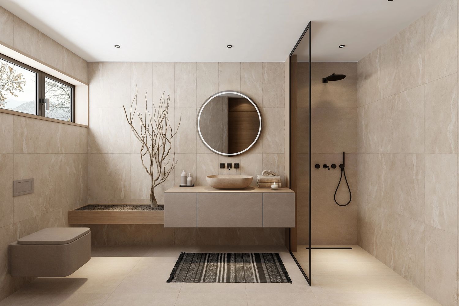 Minimalist beige bathroom with a floating vanity, round mirror, and walk-in shower.