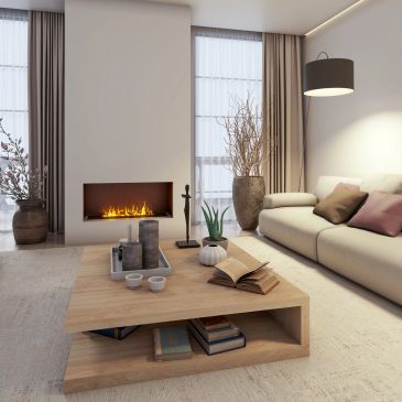 Cozy modern living room with fireplace and neutral decor.