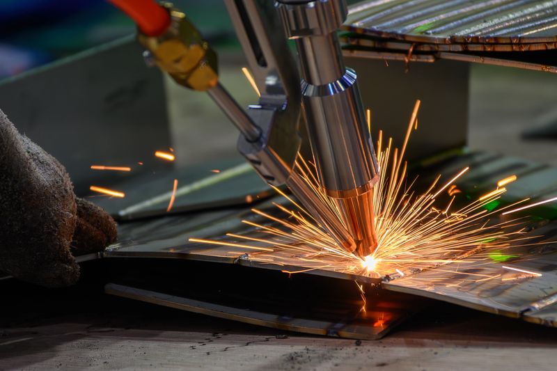 Close up scene the laser welding process by hand held laser welding machine. The high technology welding process by laser welding machine.