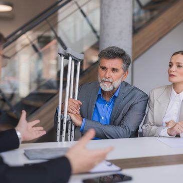 Motor accident consultation with injured client and advocate