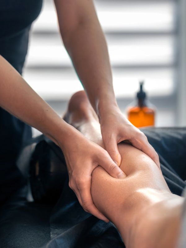 Person receiving a leg massage.