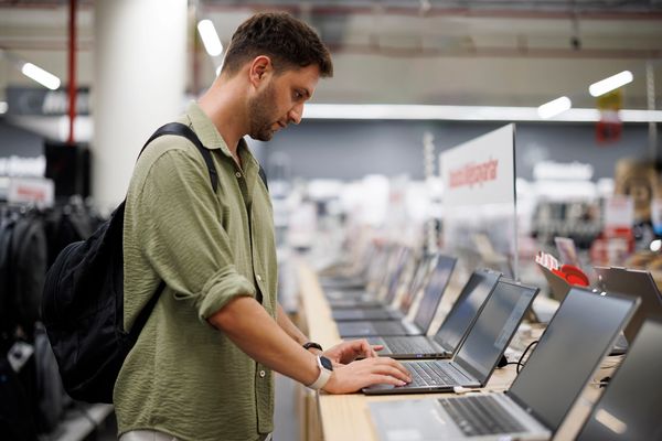 Man, shopping for laptop deals.