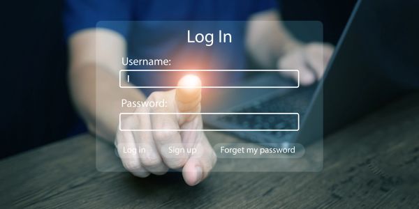 Person logging in using a touchscreen interface.
