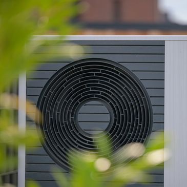 Close-up of an outdoor air source heat pump unit.
