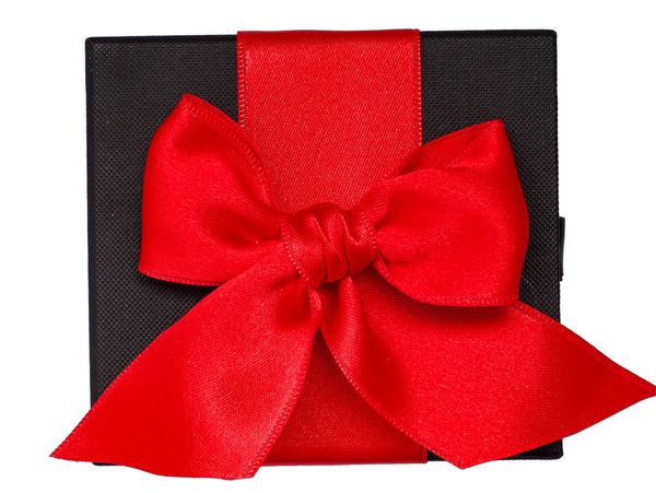 A Corporate Gift in a black box with a big red bow tied around it.