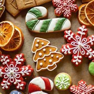 Festive Christmas cookies including candy canes, snowflakes, and a Christmas tree.