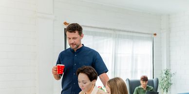 Family having breakfast together at home.