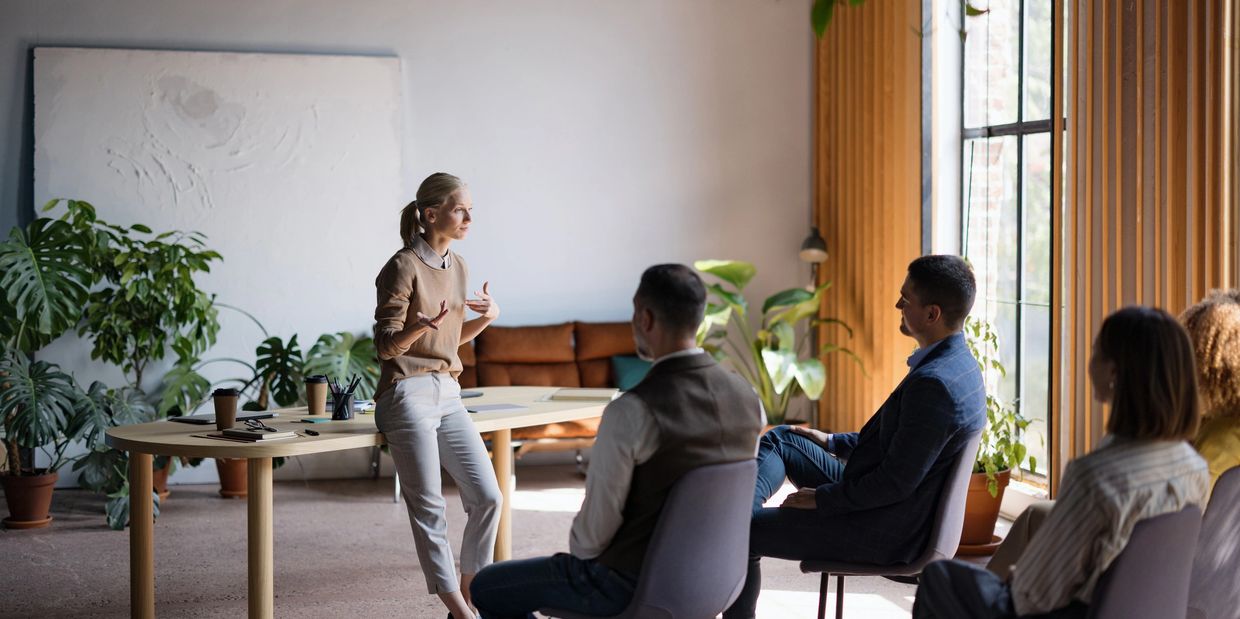 corporate company wellness class course program. teacher with students