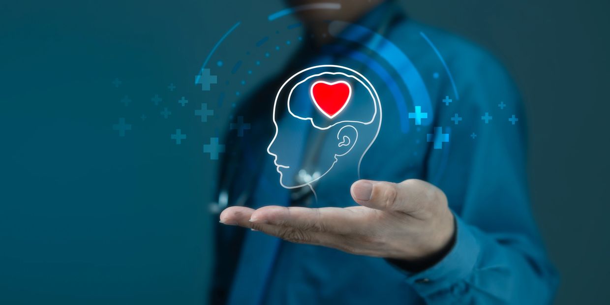 Image of a brain with a heart, representing compassionate resources for OCD