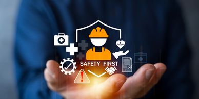Safety first concept with icons and a worker symbol.