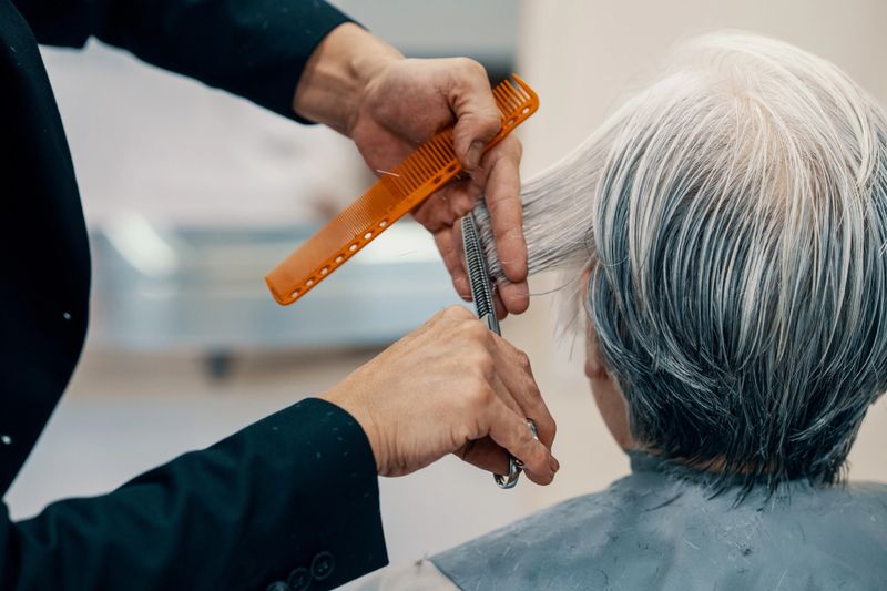 Senior woman getting her hair done at a salon in Japan
