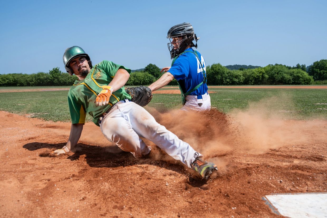 Advertisement for Aaron Miles' baseball lessons with individual and group options.