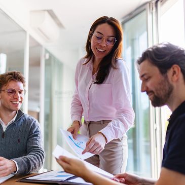 Colleagues collaborating in a bright office.