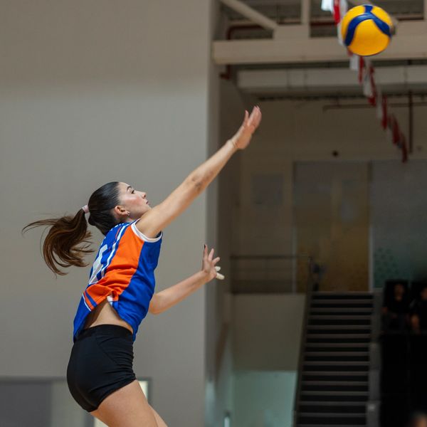 A person playing volleyball