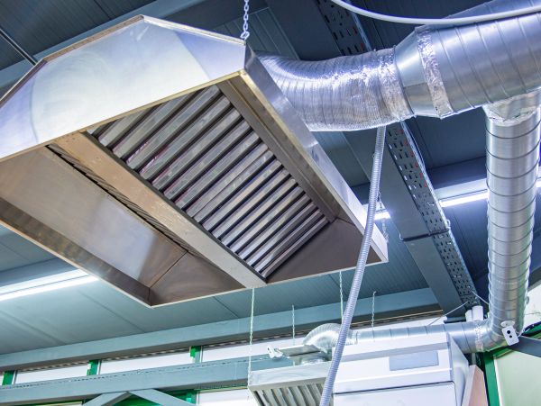 Industrial kitchen exhaust hood and ventilation ducts.