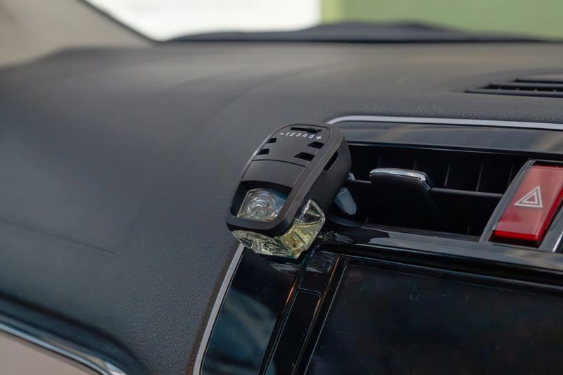 A car air freshener installed in the car AC vent