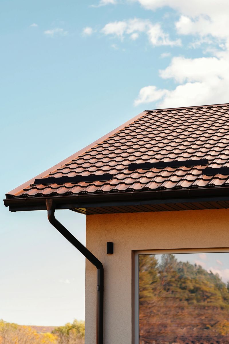 terracotta roof view, highquality image showcasing tiled roof with hill backdrop and glass
