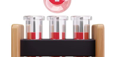 Three test tubes with blood and a medical drop symbol above them.