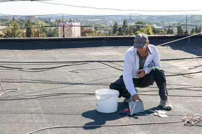 Commercial roof repair technician