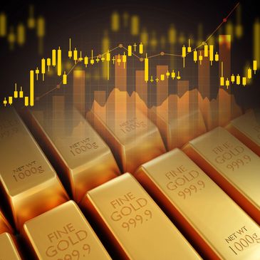 Gold bars with financial charts overlay representing investment and market trends.