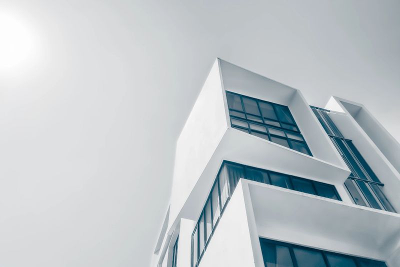 Small part of a modern plain apartment building, taken a Street  in Bangkok, colored and extensive image editing,  for a generic appearance.
