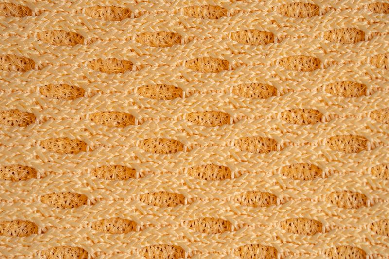 Breathable yellow design showcases the innovation of airflow and comfort in engineered fabric, celebrates structure and softness built for performance and endurance.