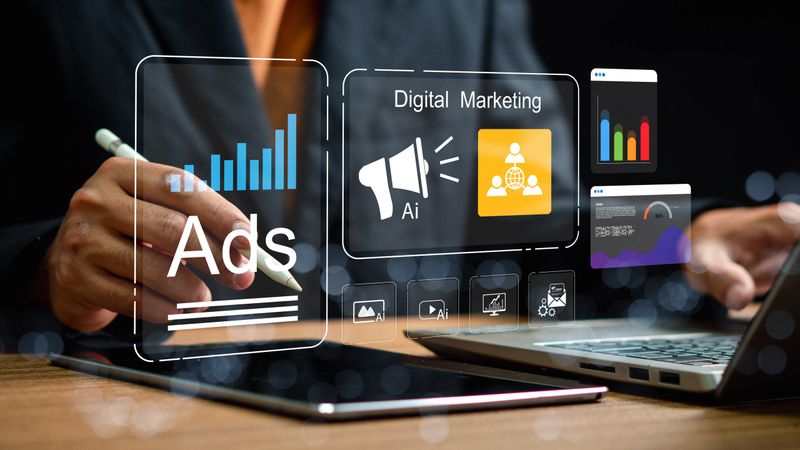 AI digital marketing concept showing businessperson using technology to manage online advertising, analytics, and data-driven ad performance with futuristic interface for business growth.